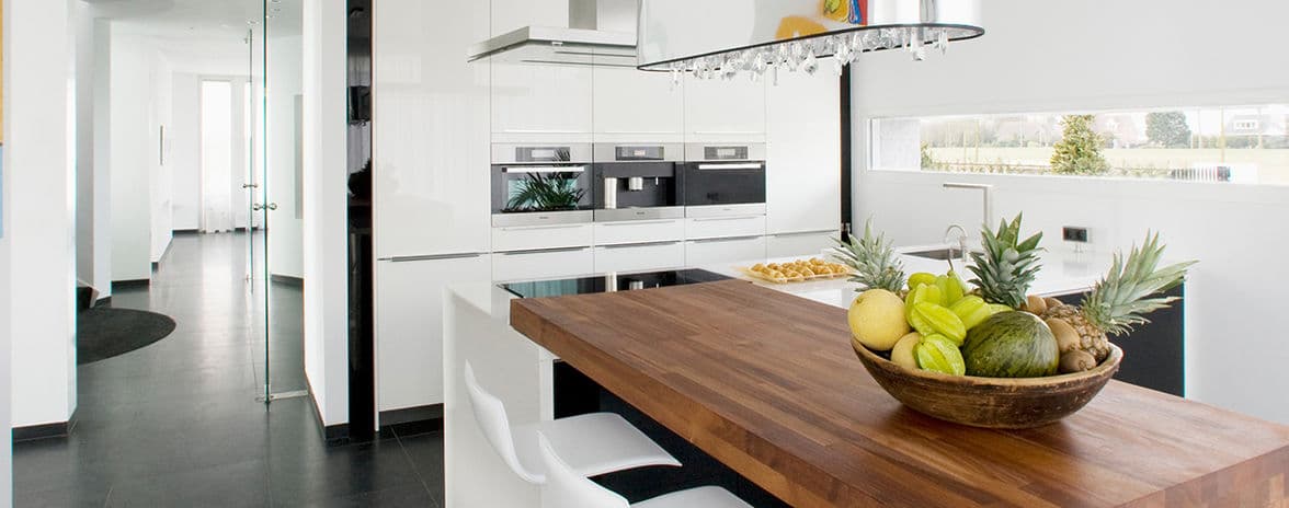 modern kitchen ,wooden kitchen counter with plate with fruits
